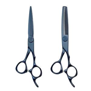 Juego de tijeras de corte y adelgazamiento de acero 440C japonés con tornillo de gema roja - Product Image 1