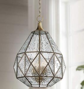 Farol colgante marroquí artesanal de hierro macizo con patrones rústicos que añaden un toque vintage a los espacios. - Product Image 2