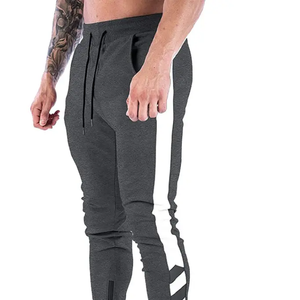 Pantalones lisos de secado rápido estilo callejero de algodón de tendencia para hombre gimnasio correr Jogger ajuste suelto y ropa de entrenamiento Jogger pantalón - Product Image 1