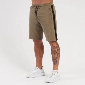 กางเกงขาสั้นลำลองผู้ชายสไตล์วินเทจสีพื้นผ้าฝ้าย100% แบบสมดุลใส่ได้พอดีตัวบริการ OEM แห้งเร็วเป็นมิตรกับความชื้น - Product Image 5