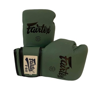 นวมชกมวย Fairtex รุ่น CP-BG-75 หนังวัวแท้ สีเขียวเข้ม สำหรับฝึกซ้อมและแข่งขัน - Product Image 1