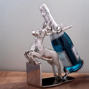 Porte-bouteille de vin en fer moderne avec forme animale simple utilisé pour les cadeaux de bureau à usage personnel et les affichages élégants à la maison - Product Image 1