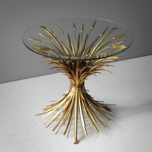 Table en aluminium floral au design haut de gamme avec surface en verre trempé, parfaite pour les salons luxueux ou les espaces de vie formels - Product Image 1