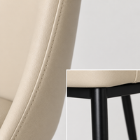 Chaise de restaurant commerciale moderne, revêtement en PU crème, dossier haut, assise souple, pieds en métal coniques noirs, pour hôtel