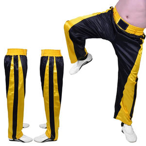 2025 Color amarillo negro Venta caliente Servicio OEM Venta caliente Precio competitivo Fácil de usar Pantalones de Kick Boxing ecológicos - Product Image 1
