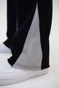 ผู้ผลิตขายส่งกางเกงวอร์มขาบานลำลองผ้าฟลีซหนานุ่มแบบสวมใส่สบาย รับผลิตตามแบบ OEM พร้อมสกรีนโลโก้แบบพิมพ์นูน 3 มิติ สำหรับฤดูใบไม้ร่วง - Product Image 5