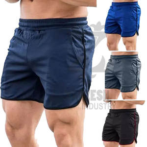 กางเกงขาสั้นเล่นยิมสไตล์สตรีทสำหรับผู้ชายกางเกงขาสั้นออกกำลังกายวิ่งสีพื้นสำหรับออกกำลังกายเล่นกีฬาออกกำลังกายป้องกันการเพาะกายยับ - Product Image 1