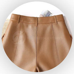 Pantalones cortos de cuero genuino de cintura alta con falda de mujer de cuero de bolsillo frontal de embalaje personalizado - Product Image 4