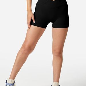Venta al por mayor de pantalones cortos de motorista sin costuras de color sólido para correr las mujeres de yoga pantalones cortos de gimnasio de control de barriga mujeres pantalones cortos de yoga amarillo - Product Image 6