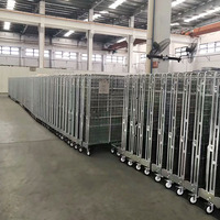Conteneur à linge démontable en treillis métallique galvanisé, entièrement soudé, avec panneaux amovibles pour le transport du linge hospitalier