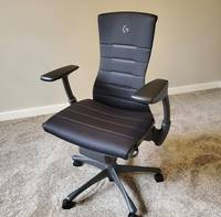 Chaise de bureau ergonomique moderne Miller X à dossier mi-haut, pivotante, pour cadre dirigeant, avec structure en acier, siège rembourré en tissu, hauteur réglable, noire