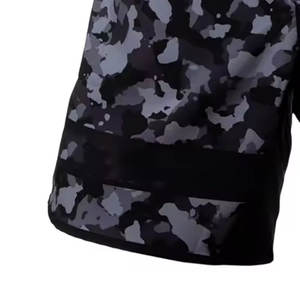 กางเกงขาสั้นศิลปะการต่อสู้แบบผสมพร้อมวัสดุคุณภาพสูงและดีไซน์ตามสั่งสำหรับเสื้อแบบสั้น MMA ของคุณเองพร้อมโลโก้ของคุณ - Product Image 5