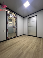 Cabine modulaire préfabriquée de luxe de 20 pieds 40 pieds Maison en paquet plat de 2 chambres à coucher fabriquée à partir de conteneurs Maison en conteneur moderne extensible pour hôtel