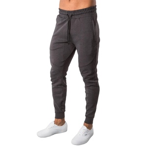 Vêtements de couleur unie pour hommes Gym Fitness Running Wear 100% coton Logo personnalisé avec poches latérales Pantalon respirant pour hommes - Product Image 1