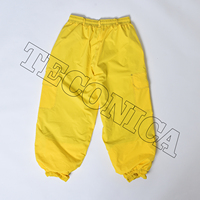 Pantalones de Nieve Amarillos de Alto Rendimiento con Ribete Negro, Forro Aislante Cálido, Múltiples Bolsillos con Cremallera y Cintura Ajustable con Cordón