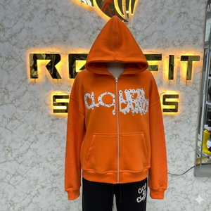เสื้อฮู้ดซิปสีส้มโคลเวอร์ ยูนิเซ็กส์ สตรีทแวร์ ผ้าฟลีซ โอเวอร์ไซส์ พิมพ์ลายโลโก้ด้านหน้าประดับคริสตัล แขนเสื้อปกติ สำหรับฤดูใบไม้ร่วง - Product Image 1