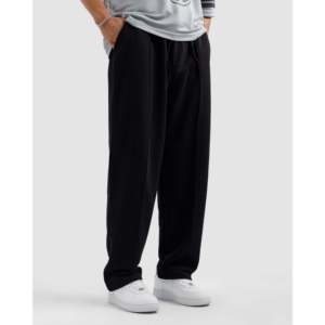 Pantalones plisados negros esenciales con corte holgado - Product Image 1