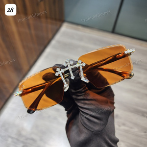 แว่นกันแดดเพชรโมอิสทรงฮิปฮอปสีส้มสะท้อนแสงกรอบสแตนเลสแร็ปเปอร์ทันสมัย - Product Image 1