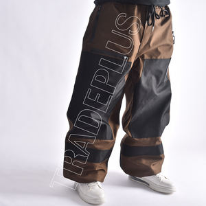 Pantalon de neige personnalisé avec logo, patchwork marron et noir, avec des poches complètes supplémentaires, des fermetures éclair de ventilation et une taille ajustable - Product Image 2