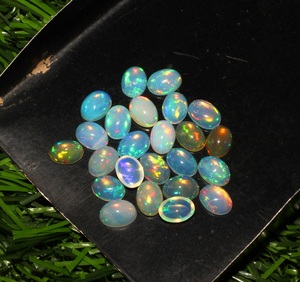 24-Piece 13.60 Carats Ethiopian Opal Cabochons Natural Ovals 5x7mm Loose Gemstones Oval Cut - Product Image 6