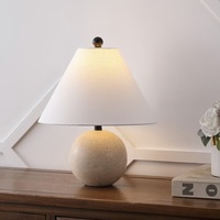 Lámpara de mesa redonda de piedra travertino de lujo con pantalla de tela de lino premium, iluminación ambiental cálida para decoración moderna y elegante