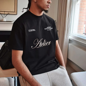 เสื้อยืดผ้าฝ้ายสีดำโอเวอร์ไซส์สำหรับผู้ชายเสื้อพิมพ์โลโก้คลับชุดแนวสตรีทย้อนยุคทรงหลวมแบบลำลองธรรมดาสำหรับขายส่ง - Product Image 6