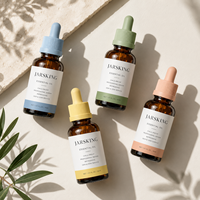Flacon d'huile essentielle ambrée personnalisé de 30 ml, récipient en verre pour sérum avec bouchons pastel multicolores, collection de marques de niche OEM ODM OBM