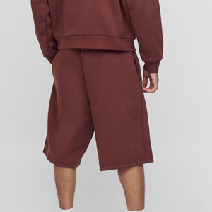 OEM/ODM 100% pantalones cortos de jogging de algodón para hombres Color sólido de longitud larga con bolsillos laterales cómodo transpirable boxy hombre Jogger - Product Image 2