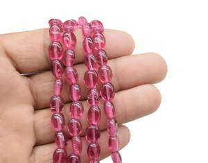 Perles de pierres précieuses de forme ovale lisse en tourmaline rose naturelle 6mm perles polies en vrac pour la fabrication de bijoux prix de gros - Product Image 2