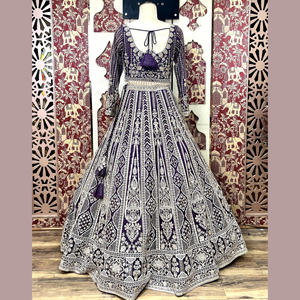 El último Lehenga en color vino de cebolla adornado con ritmos y trabajo manual pesado para recepciones de bodas y grandes festivos de la India - Product Image 2