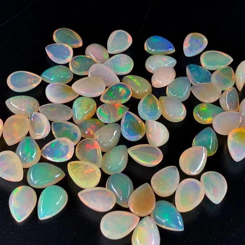 High Grade Welo Ethiopian Opal Pear Shape All Size Flat Back Multi Fire White Opal Gemstone Cabochons Best Price From Supplier