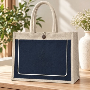 Bolsa de Yute Natural Negra con Bolsillo Frontal de Lona con Ribete, 17x13x6 Pulgadas, Venta al Por Mayor, Logotipo Personalizado - Product Image 1