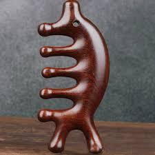 PEIGNE EN BOIS AUX HERBES INFUSÉ D'ESSENCE DE FEUILLE DE CATAPPA - Product Image 4