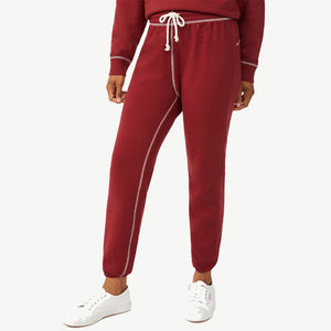 Mejor diseño logotipo personalizado mujer invierno cintura elástica plana calle Joggers pantalones de secado rápido pantalones de chándal servicio OEM 100% algodón - Product Image 3