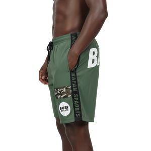 กางเกงว่ายน้ำผู้ชาย ผ้าโพลีเอสเตอร์ทาสลอน 130 GSM แห้งเร็ว สีเขียวมะกอก แถบข้างสีดำ ปักโลโก้ - Product Image 3