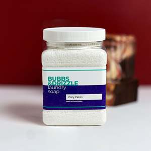 BUBBS DRIZZLE Cozy Cabin Laundry <b>Detergent</b> Powder 30 Oz. with Warm Woodsy Escape Fragrance - Product Image 1