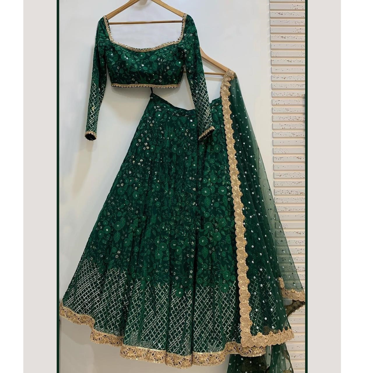 Shop Our Exclusive Dark Green Lehenga Choli with Embroidery Shop Our Exclusive Dark Green Lehenga Choli with Embroidery