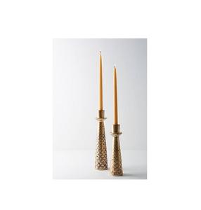 Elegant golden finished aluminum <b>candle</b> holder suitable for lighting up romantic <b>dinners</b> and evening home decor setups - Product Image 1