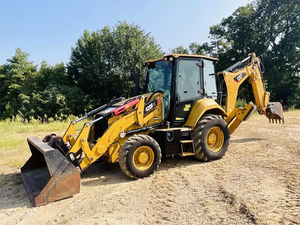 Chargeuse-pelleteuse d'origine Cat 420F avec chargeur avant et arrière, jaune, 4x4, fabrication américaine, prête à être expédiée. - Product Image 6