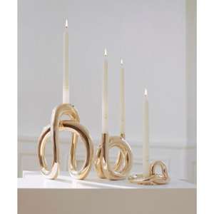 Highly decorative brass <b>candle</b> holder featuring opulent Victorian patterns and a polished <b>gold</b>-tone finished for ambiance - Product Image 4