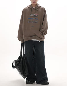 ผลิตชุดวอร์มฮู้ดดี้ผ้าเทอร์รี่คอตตอน 100% แบบสั่งทำพิเศษ ดีไซน์ปักลาย สีตัดกัน ระบายอากาศได้ดี สไตล์ลำลองสีดำ - Product Image 3