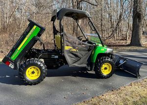 Vehículo Utilitario John Deere XUV 520 de 4 Asientos, Motor a Gasolina, Transmisión Automática, Neumáticos R16, Ruedas Verde Amarillo - Product Image 5