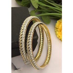 Brazaletes étnicos CZ con acabado dorado antiguo de diseñador, latón con talla intrincada para mujeres y niñas para ocasiones tradicionales - Product Image 1