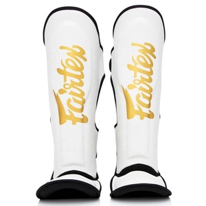 Pro Combat Sports Protège-tibias - Équipement de protection haute performance pour le Muay Thai et le MMA - Conception ergonomique en jaune vif - Product Image 1