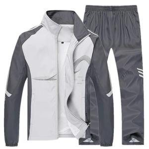 Conjunto de ropa deportiva de nuevo estilo para hombre, traje de entrenamiento físico de poliéster para correr con bolsillo con cremallera a prueba de viento para correr en invierno - Product Image 4