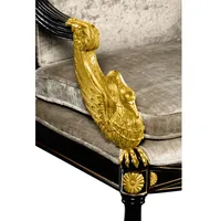 Bras sculptés à la main avec motif d'aigle doré |   Cadre en bois ébénisé avec incrustation géométrique |   Sièges de luxe en velours argenté
