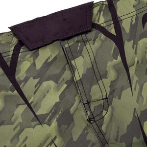 กางเกงชกมวย MMA รุ่นใหม่ล่าสุด ปี 2026 ผลิตจากผ้าโพลีเอสเตอร์ผสมสแปนเด็กซ์ ระบายอากาศได้ดี ทรงหลวม ออกแบบตามสั่ง พิมพ์ลายแบบซับลิเมชั่น - Product Image 5