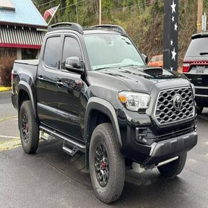 Pick-up Tacoma TRD Pro Noir 4x4 Automatique d'occasion 2020-2026 avec pneus R20, phares LED, sièges en cuir et galerie de toit en aluminium à vendre - Product Image 1