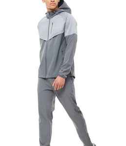 Survêtements de sport unisexes en nylon vierge OEM pour hommes, ensemble veste et pantalon de survêtement unisexe de haute qualité avec fermeture éclair réglable aux jambes - Product Image 4