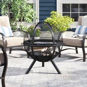 Handmade wrought iron <b>fire</b> <b>pit</b> for rustic bonfire experience and traditional outdoor fireplace functionality - Product Image 1